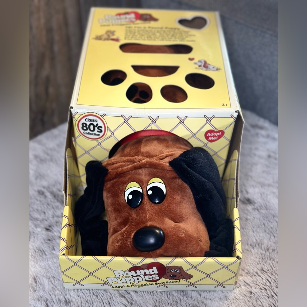 NIB Pound Puppies, look at his sweet little face.